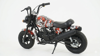 Picture of 445/Electric motorcycle for kids with a Harley Chopper design, featuring a 24V battery and variable speeds up to approximately 16-40 km/h