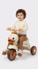 Picture of 468/A cute duck-shaped tricycle for children with colorful wheels. It features interactive elements such as side and front lights, as well as built-in music.