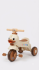 Picture of 468/A cute duck-shaped tricycle for children with colorful wheels. It features interactive elements such as side and front lights, as well as built-in music.